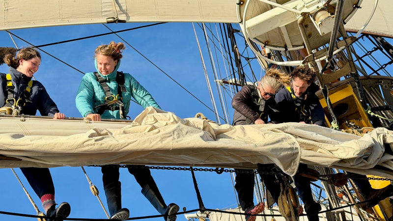 Cheyenne Richards on the yard of a tall ship